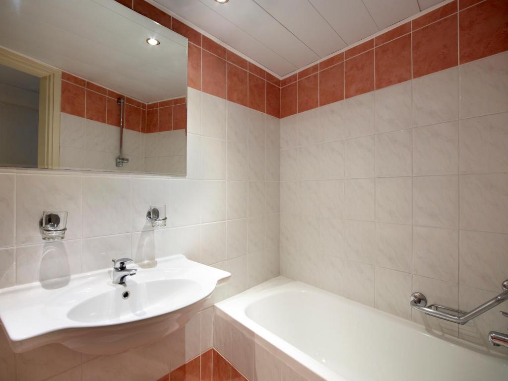 Kúpeľňa v ubytovaní Cactus Hotel