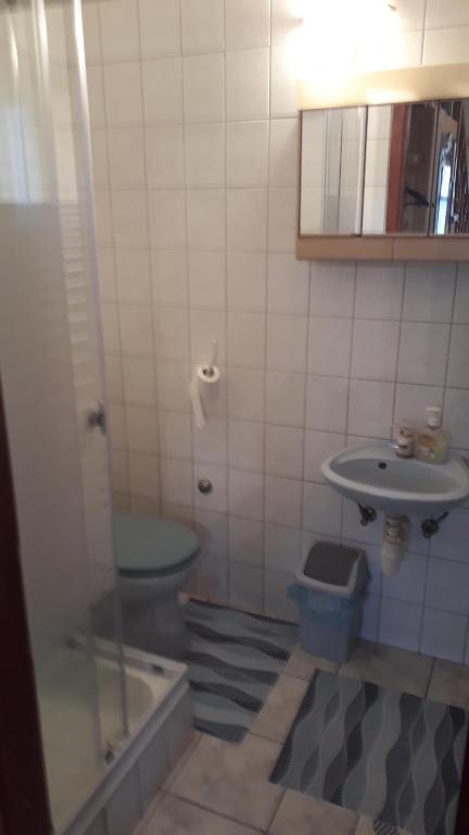 Kúpeľňa v ubytovaní Kitti Vendégház