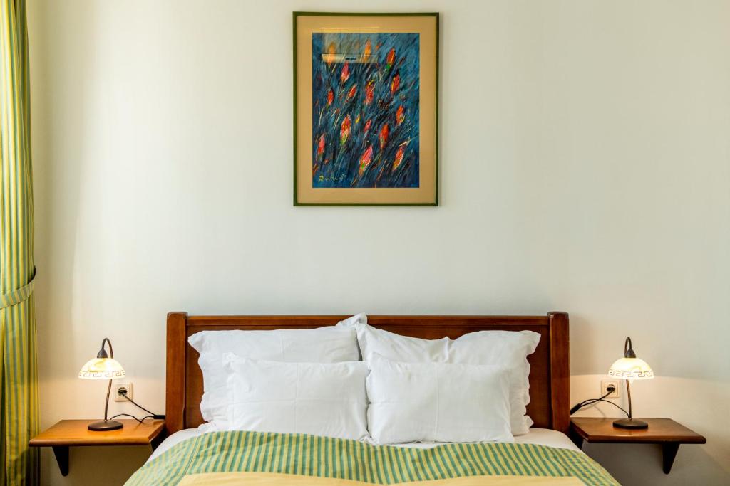 Postel nebo postele na pokoji v ubytování Hotel Sunce Vlašić