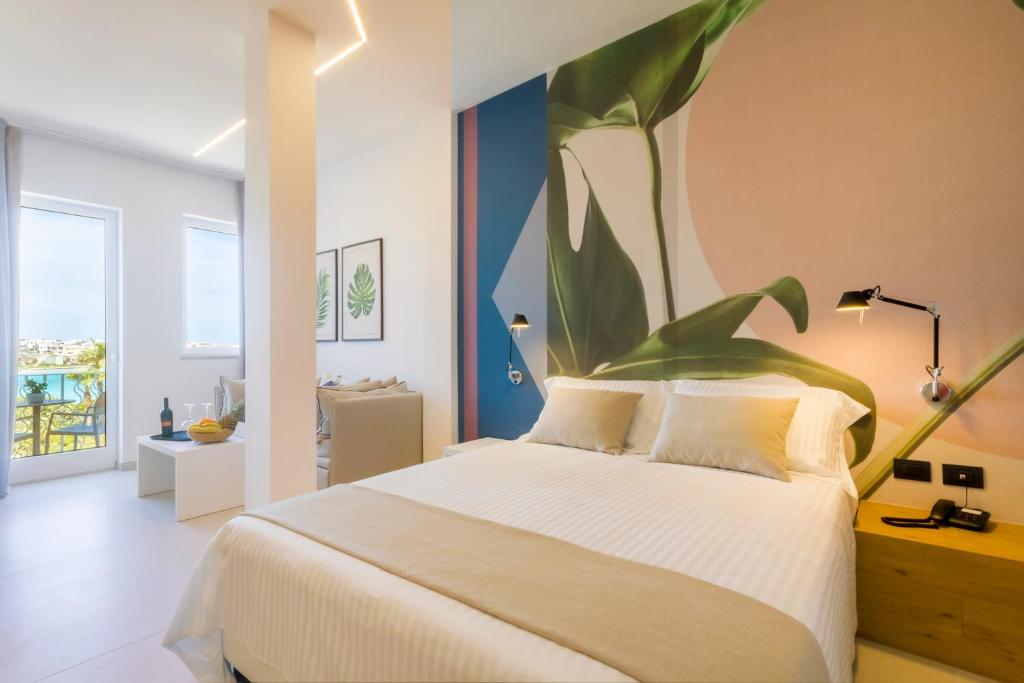 Postel nebo postele na pokoji v ubytování Hotel Bellavista - Boutique Hotel