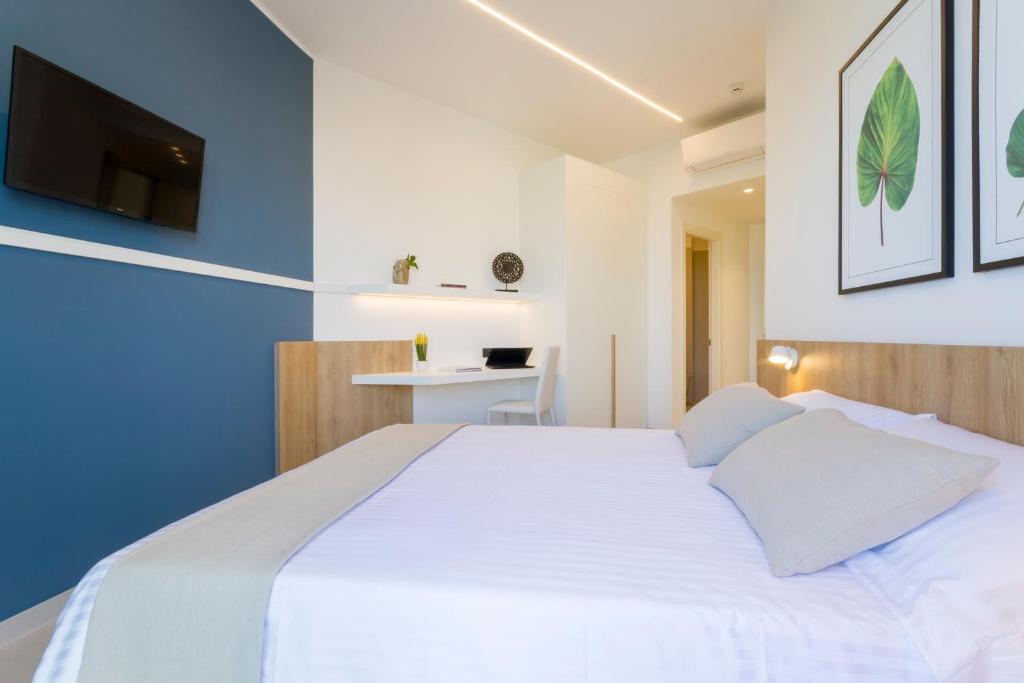 Postel nebo postele na pokoji v ubytování Hotel Bellavista - Boutique Hotel