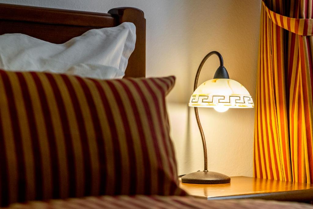 Postel nebo postele na pokoji v ubytování Hotel Sunce Vlašić