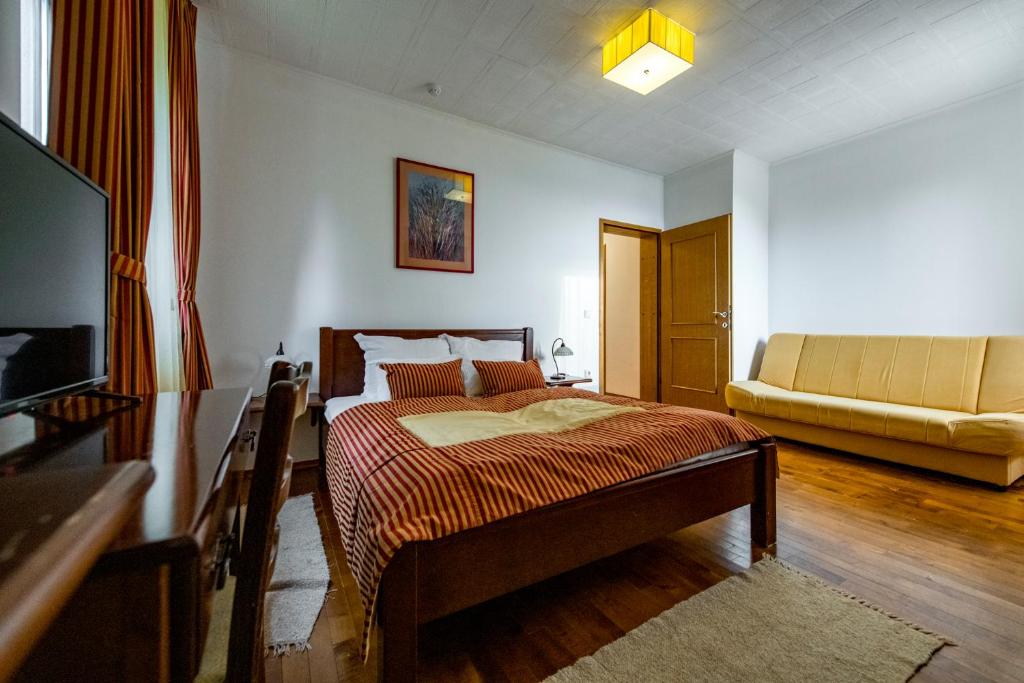 Postel nebo postele na pokoji v ubytování Hotel Sunce Vlašić