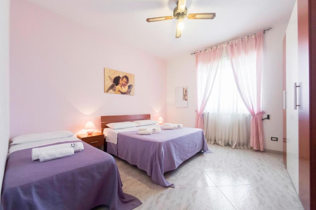 Postel nebo postele na pokoji v ubytování B&B A Casa di Danilo