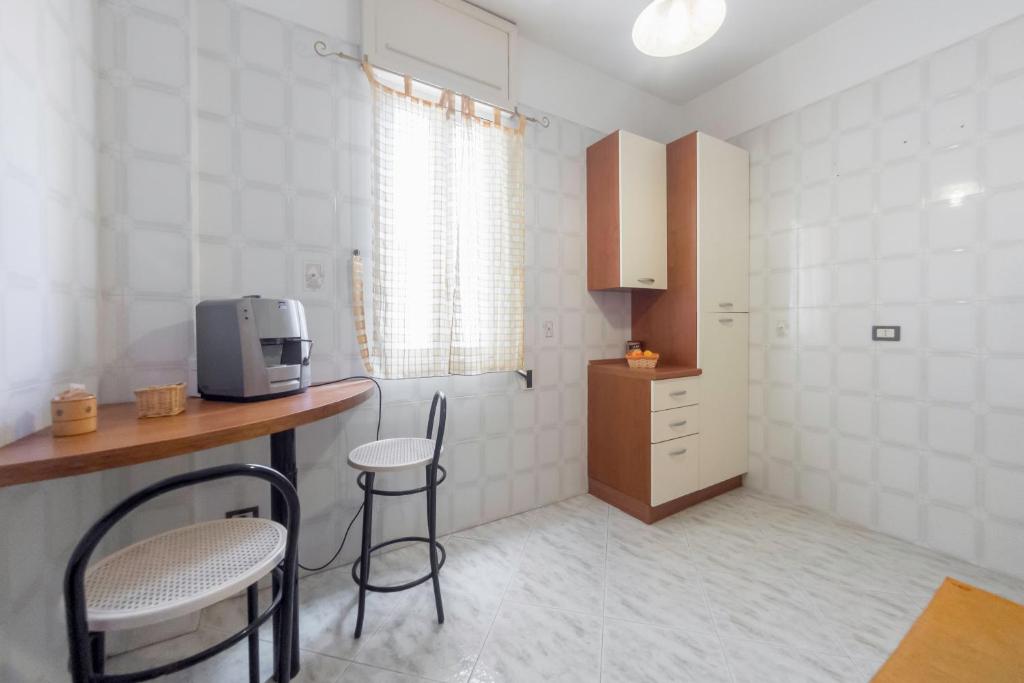 Kuchyň nebo kuchyňský kout v ubytování B&B A Casa di Danilo