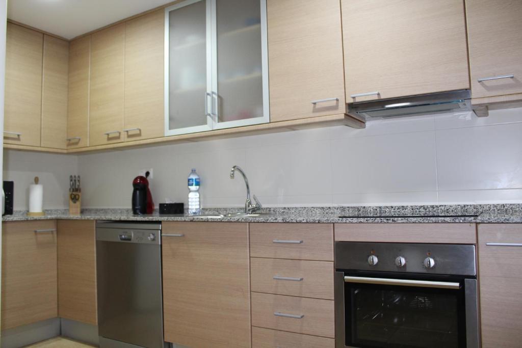 A kitchen or kitchenette at Lo Flamenc