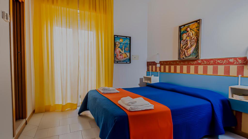 Postel nebo postele na pokoji v ubytování Hotel Plaza con piscina