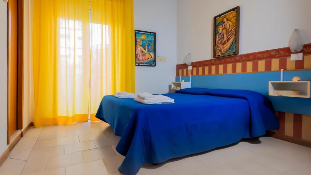 Postel nebo postele na pokoji v ubytování Hotel Plaza con piscina