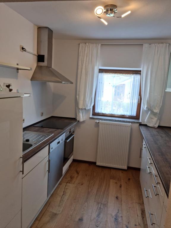 Kuchyň nebo kuchyňský kout v ubytování Holzkastl