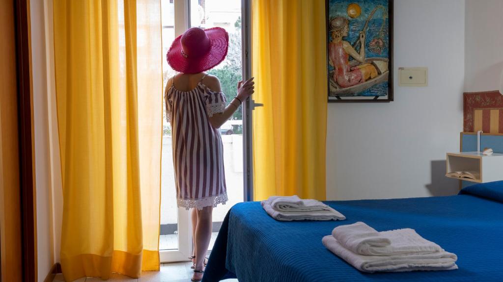 Postel nebo postele na pokoji v ubytování Hotel Plaza con piscina