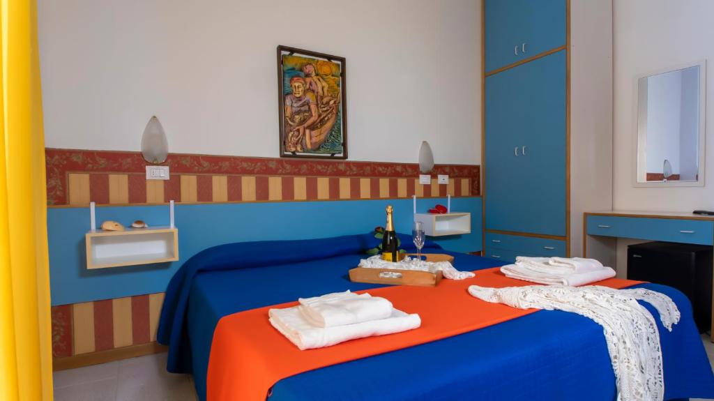 Postel nebo postele na pokoji v ubytování Hotel Plaza con piscina