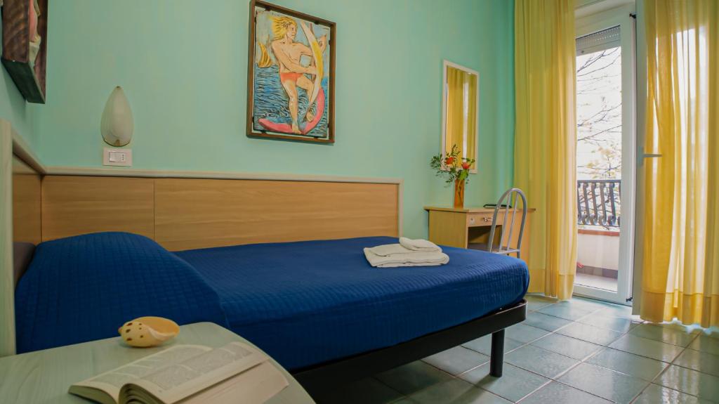Postel nebo postele na pokoji v ubytování Hotel Plaza con piscina