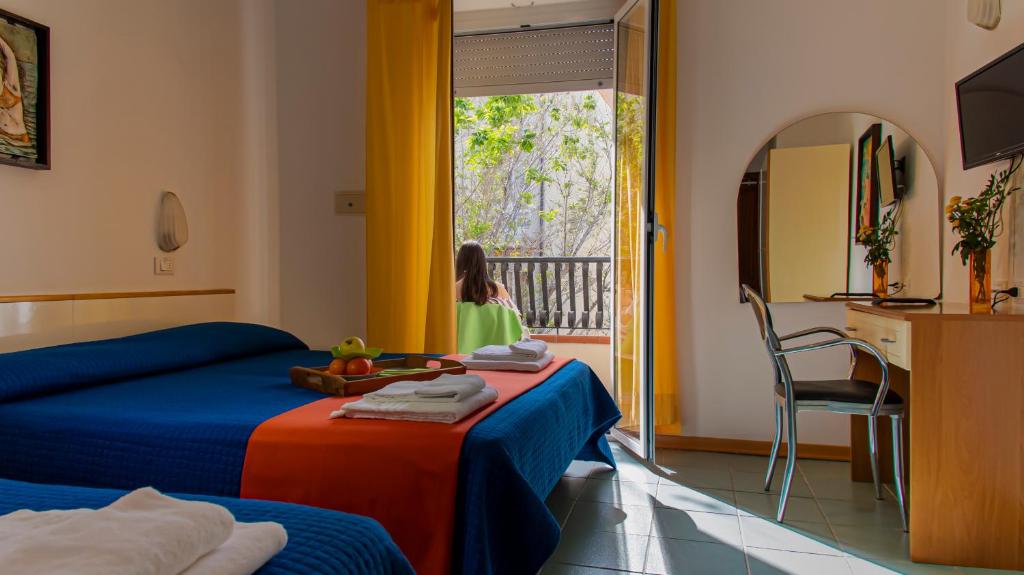 Postel nebo postele na pokoji v ubytování Hotel Plaza con piscina
