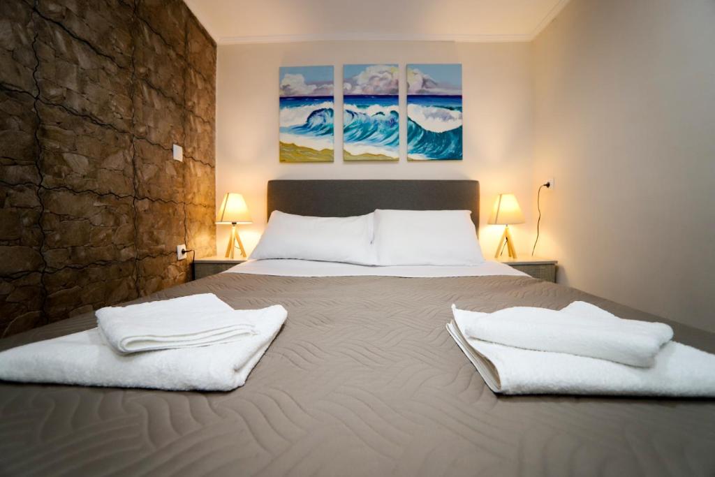 Ένα ή περισσότερα κρεβάτια σε δωμάτιο στο Corfu Old Town Alexandra's Home