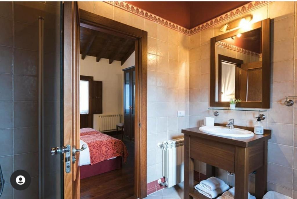 Postel nebo postele na pokoji v ubytování Apartamentos La Calvera