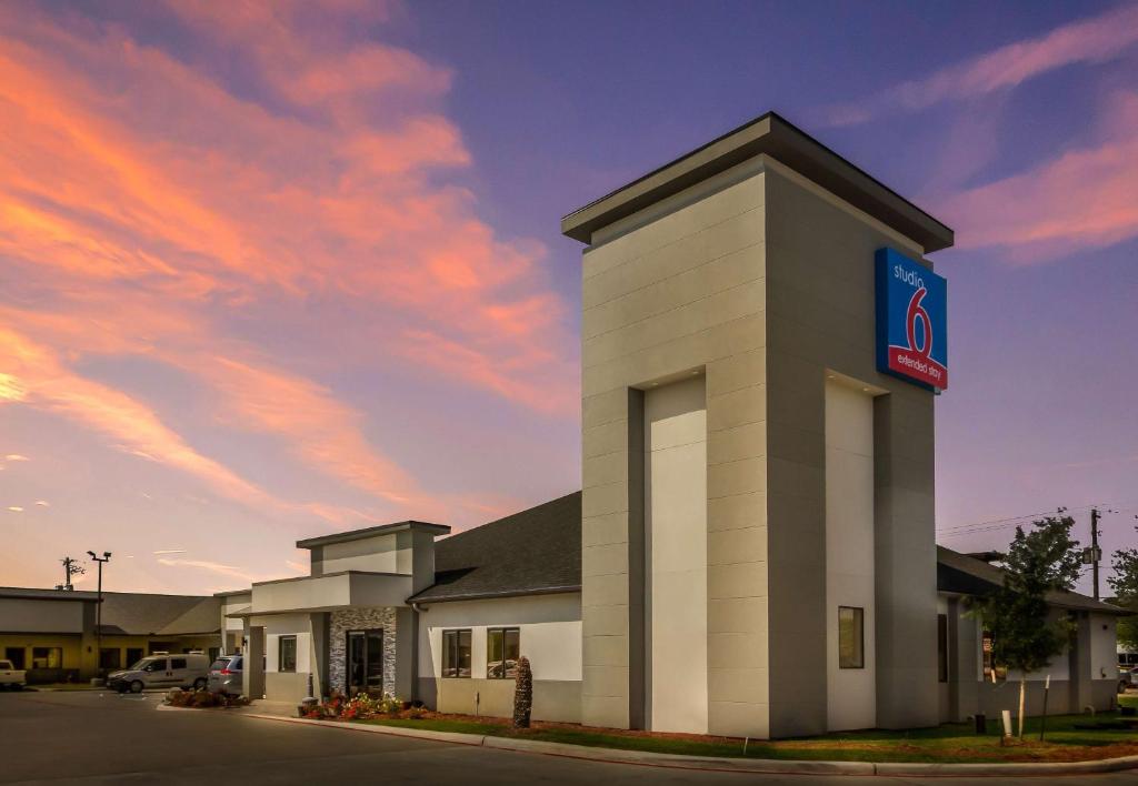 a building with a walmart sign on it at Studio 6 Deer Park, Tx in Deer Park