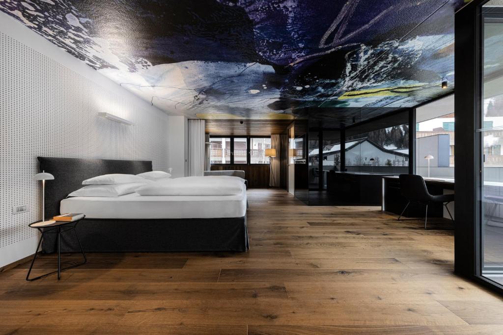 Postel nebo postele na pokoji v ubytování Ciasa de Munt Lifestyle Living