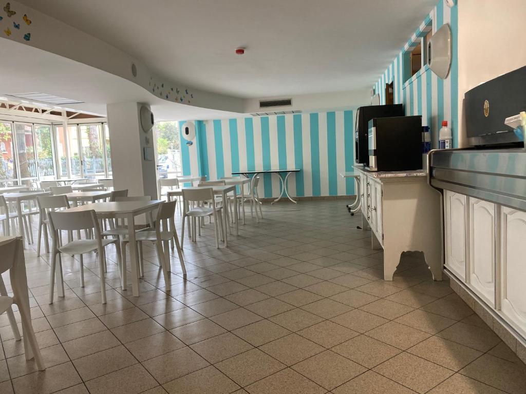 TV a/nebo společenská místnost v ubytování Hotel Modenese