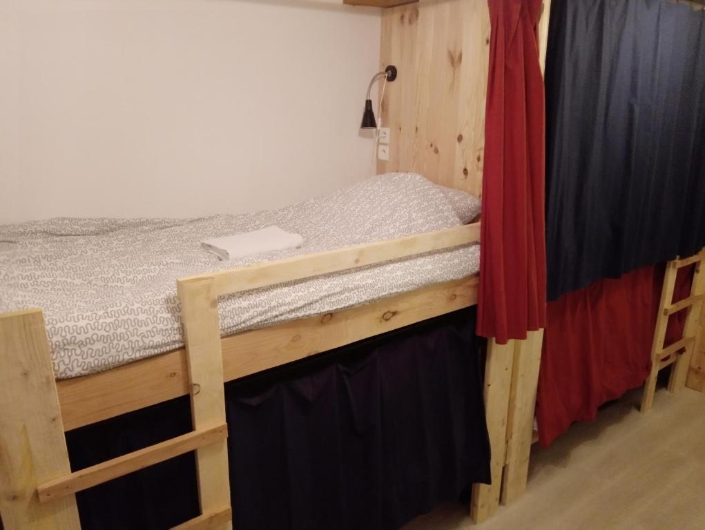 Postel nebo postele na pokoji v ubytování Cafe Vals
