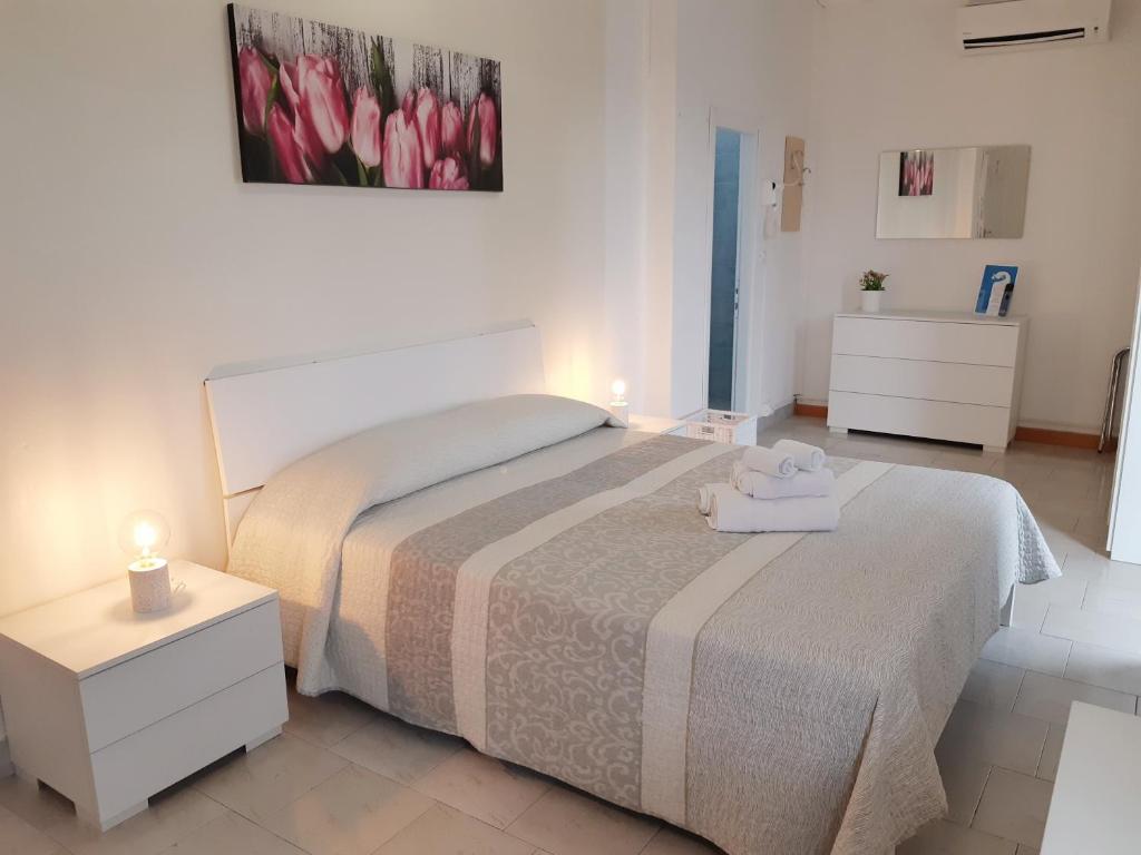 Postel nebo postele na pokoji v ubytování Hotel Mara