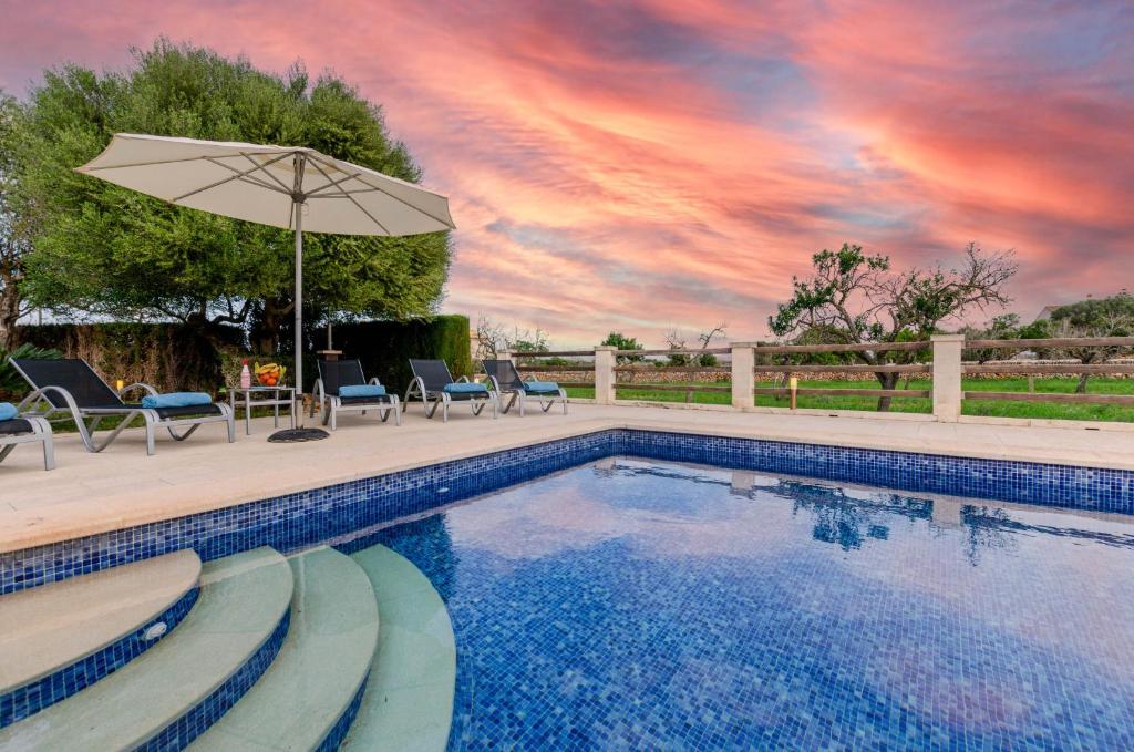 The swimming pool at or close to YourHouse Can Cuixa Villa