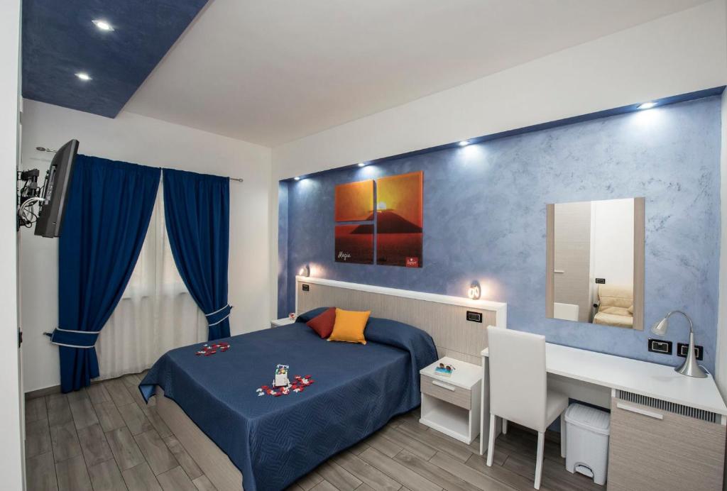 Postel nebo postele na pokoji v ubytování B&B Sunlight Tropea