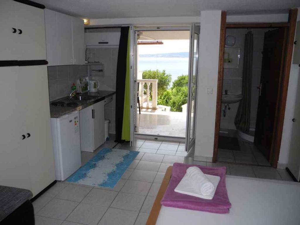 Kuchyň nebo kuchyňský kout v ubytování Apartment in Dramalj 5788