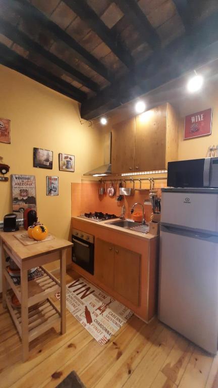 Kuchnia lub aneks kuchenny w obiekcie MGResidenceTolfa 1