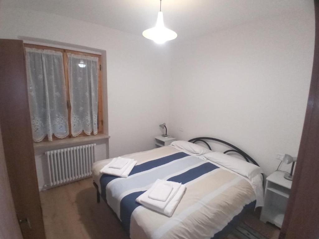 Posteľ alebo postele v izbe v ubytovaní Casa Piva