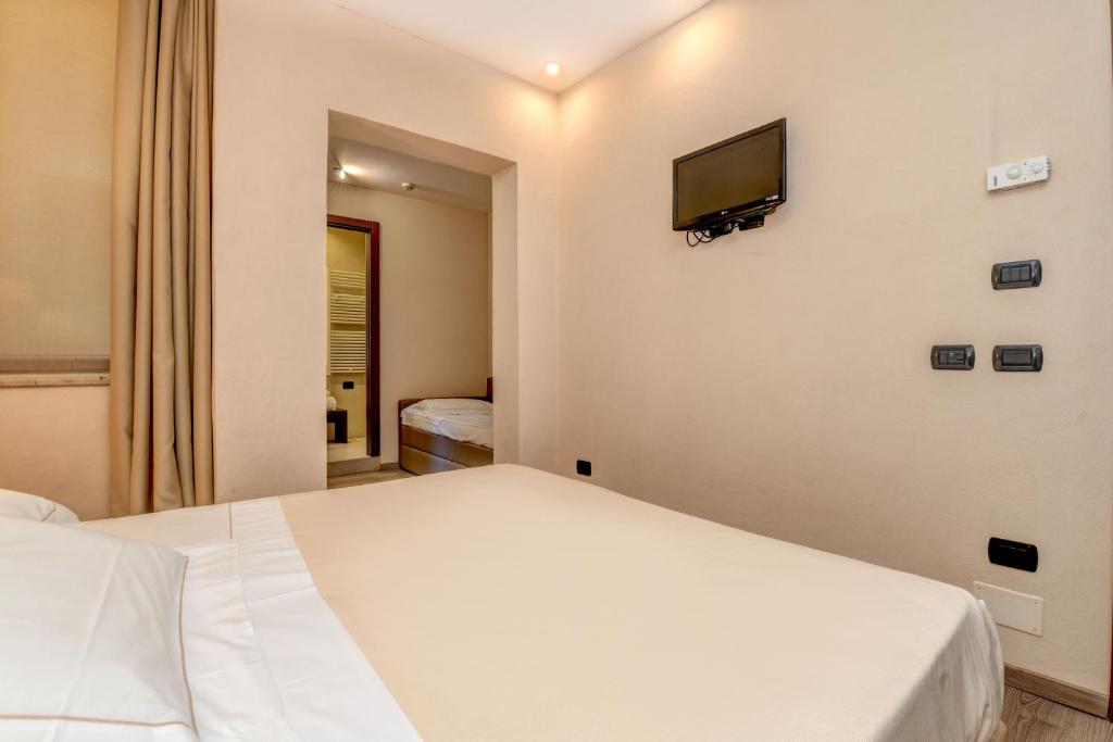 TV a/nebo společenská místnost v ubytování Hotel Tripoli
