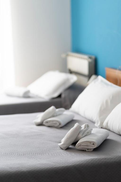 Postel nebo postele na pokoji v ubytování Hotel D'Atri