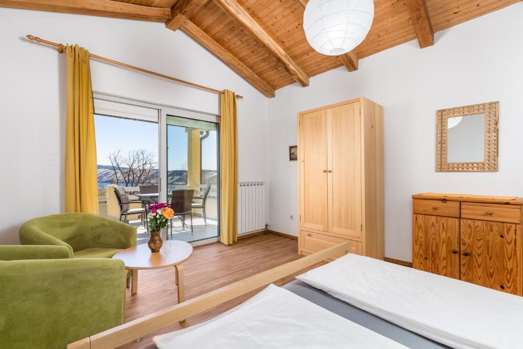 Postel nebo postele na pokoji v ubytování Apartment Ursula