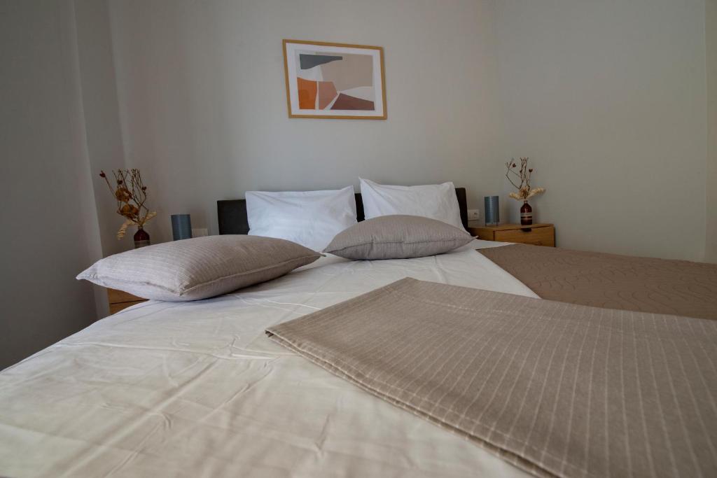 Łóżko lub łóżka w pokoju w obiekcie Anastasia s apartment