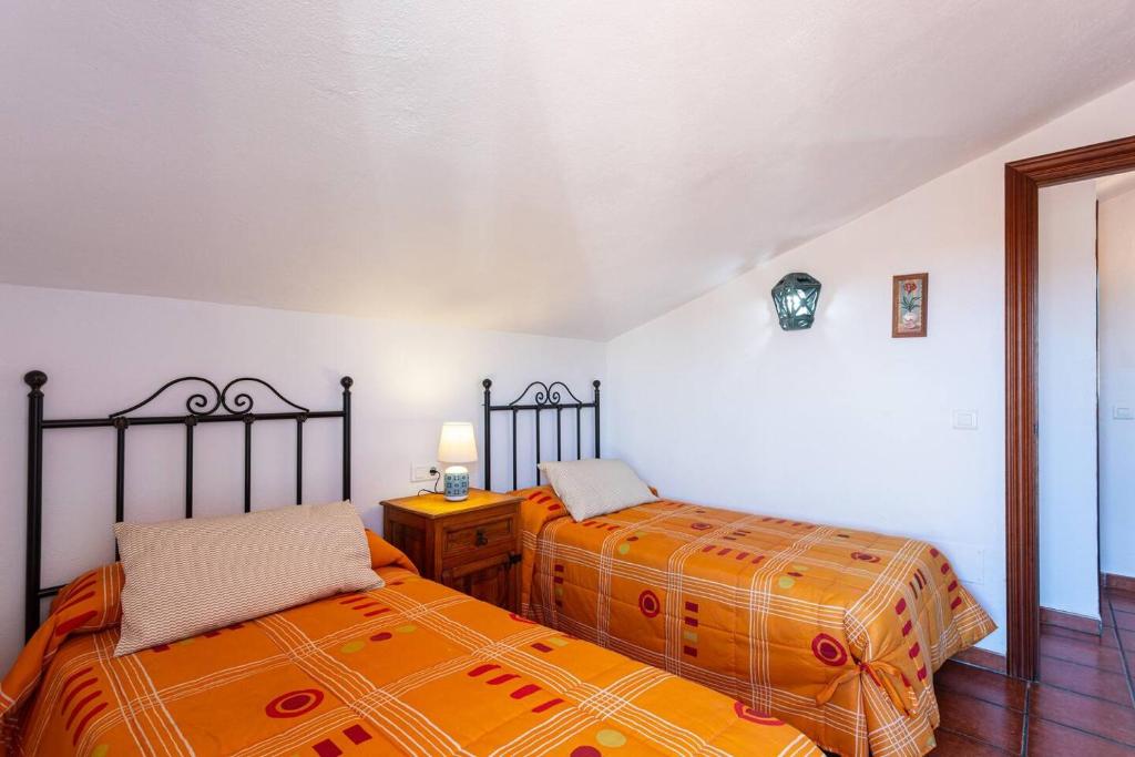 Postel nebo postele na pokoji v ubytování Villa Relax Solset