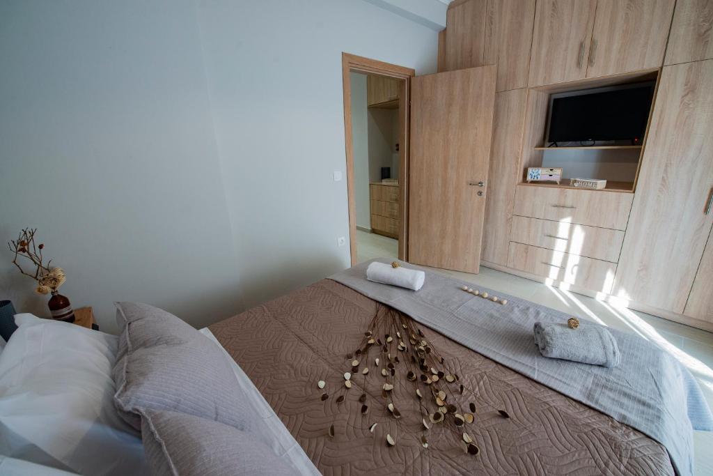 Łóżko lub łóżka w pokoju w obiekcie Anastasia s apartment