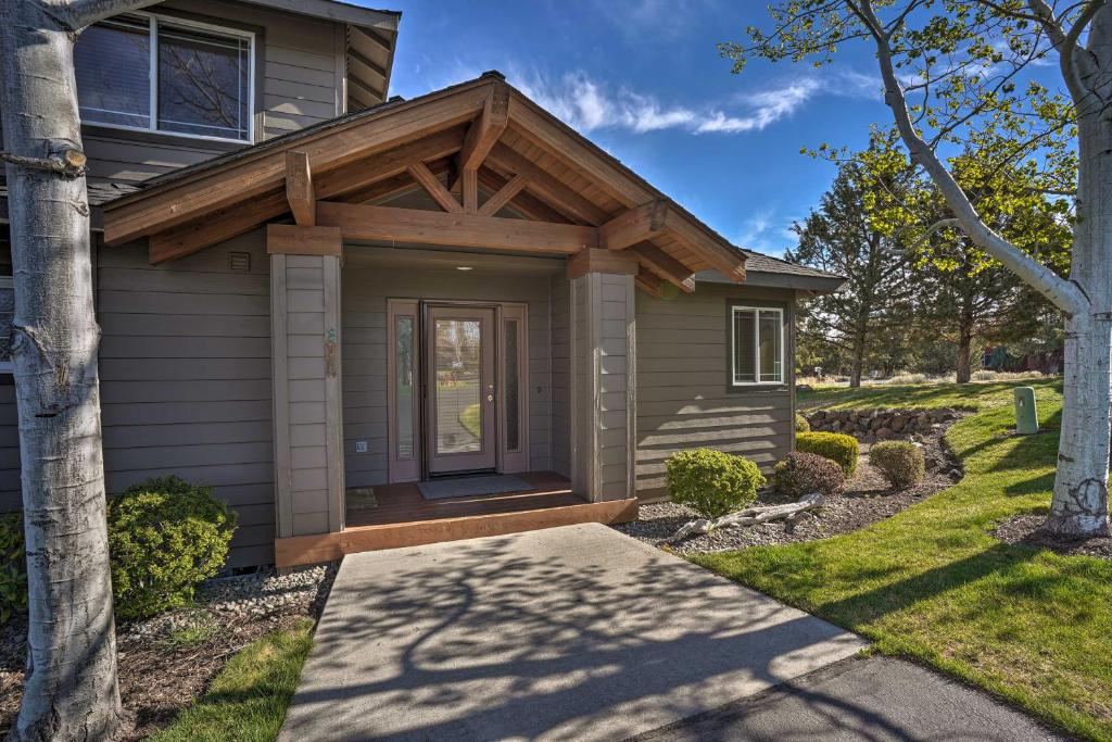 a small house with a wooden roof at Redmond Resort Townhome w/ Private Hot Tub in Redmond
