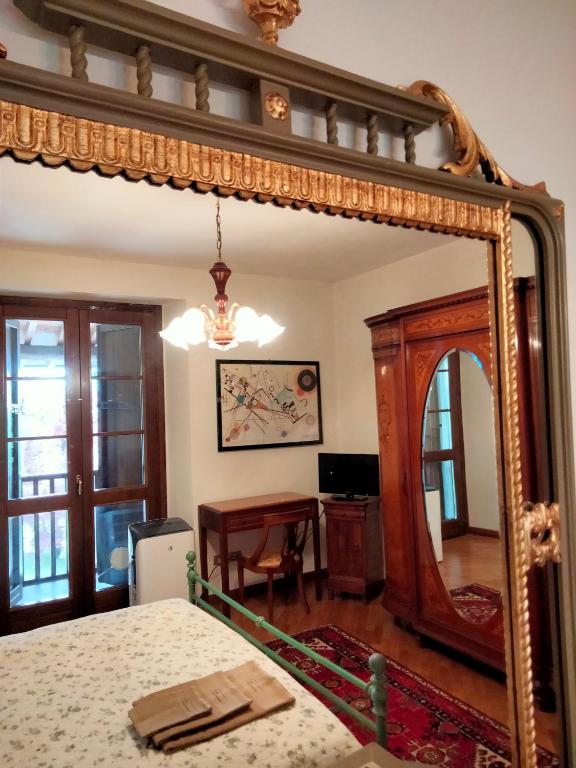 Postel nebo postele na pokoji v ubytování B&B Cascina in Franciacorta