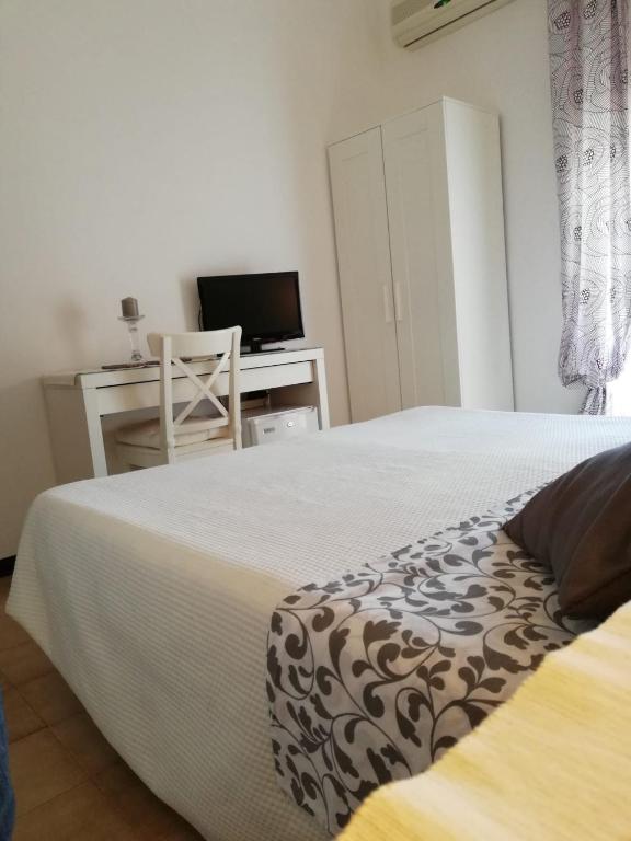 Postel nebo postele na pokoji v ubytování B&B Salvatore Lido di Noto