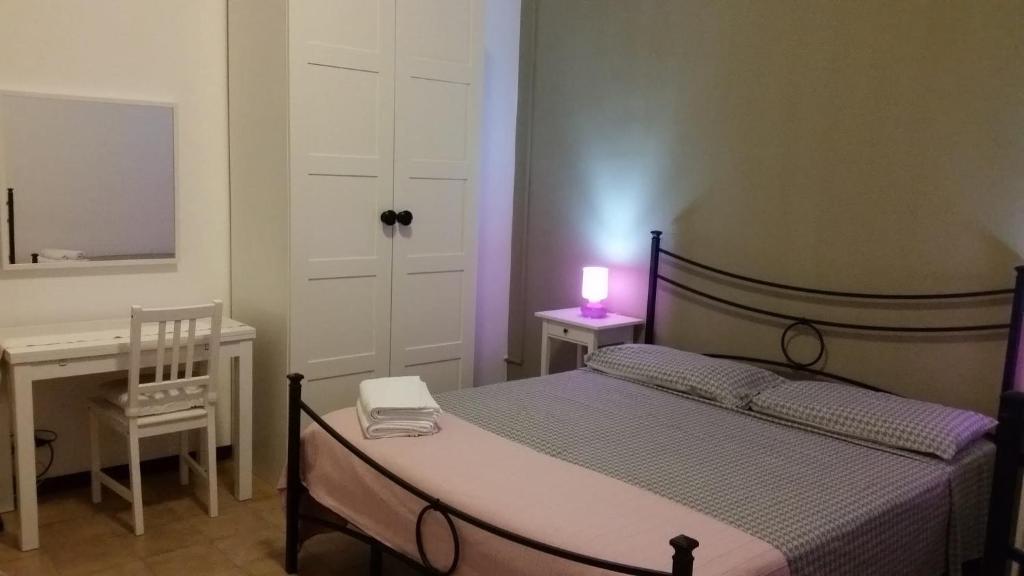 Postel nebo postele na pokoji v ubytování B&B Salvatore Lido di Noto