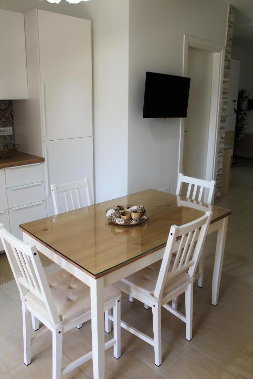 Televízia a/alebo spoločenská miestnosť v ubytovaní Casa Angelina Deluxe Suite