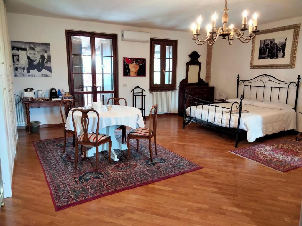 Postel nebo postele na pokoji v ubytování B&B Cascina in Franciacorta