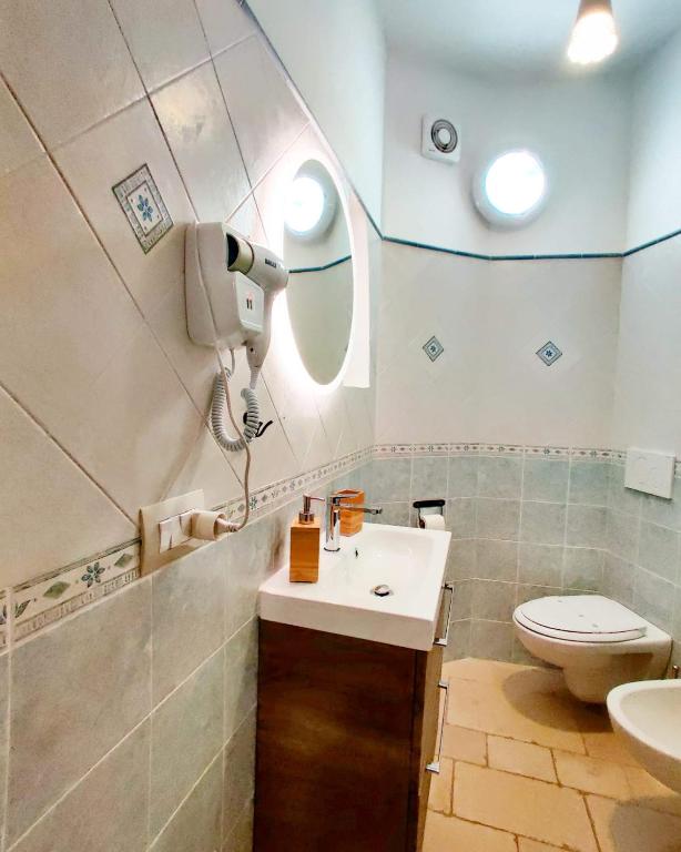 Łazienka w obiekcie C'era una Volta Apartments