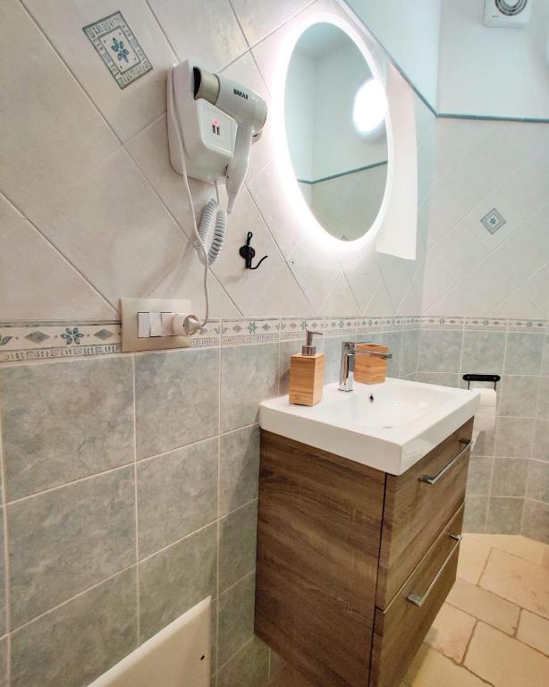 Łazienka w obiekcie C'era una Volta Apartments