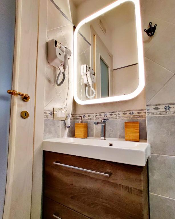 Łazienka w obiekcie C'era una Volta Apartments