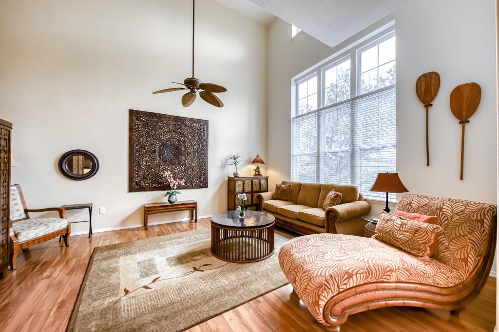 a living room with a couch and a table at Waikoloa Colony Villas 1703 in Waikoloa