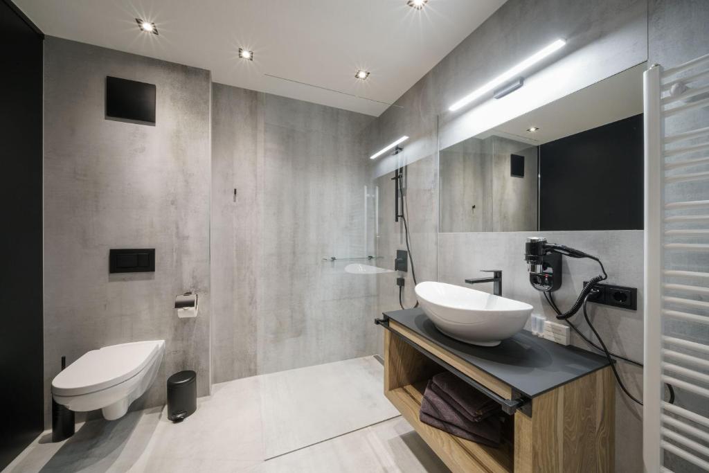 Koupelna v ubytování Atelier Garni Astei