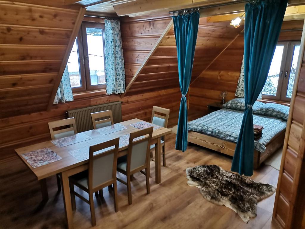 Posteľ alebo postele v izbe v ubytovaní uDany Villa Apartament