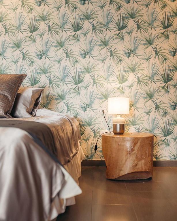 Postel nebo postele na pokoji v ubytování Tunas & Cabras Hotel