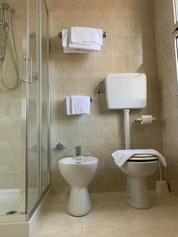 Koupelna v ubytování Hotel Al Capitano