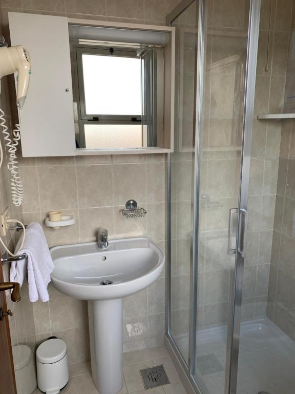 Koupelna v ubytování Hotel Al Capitano